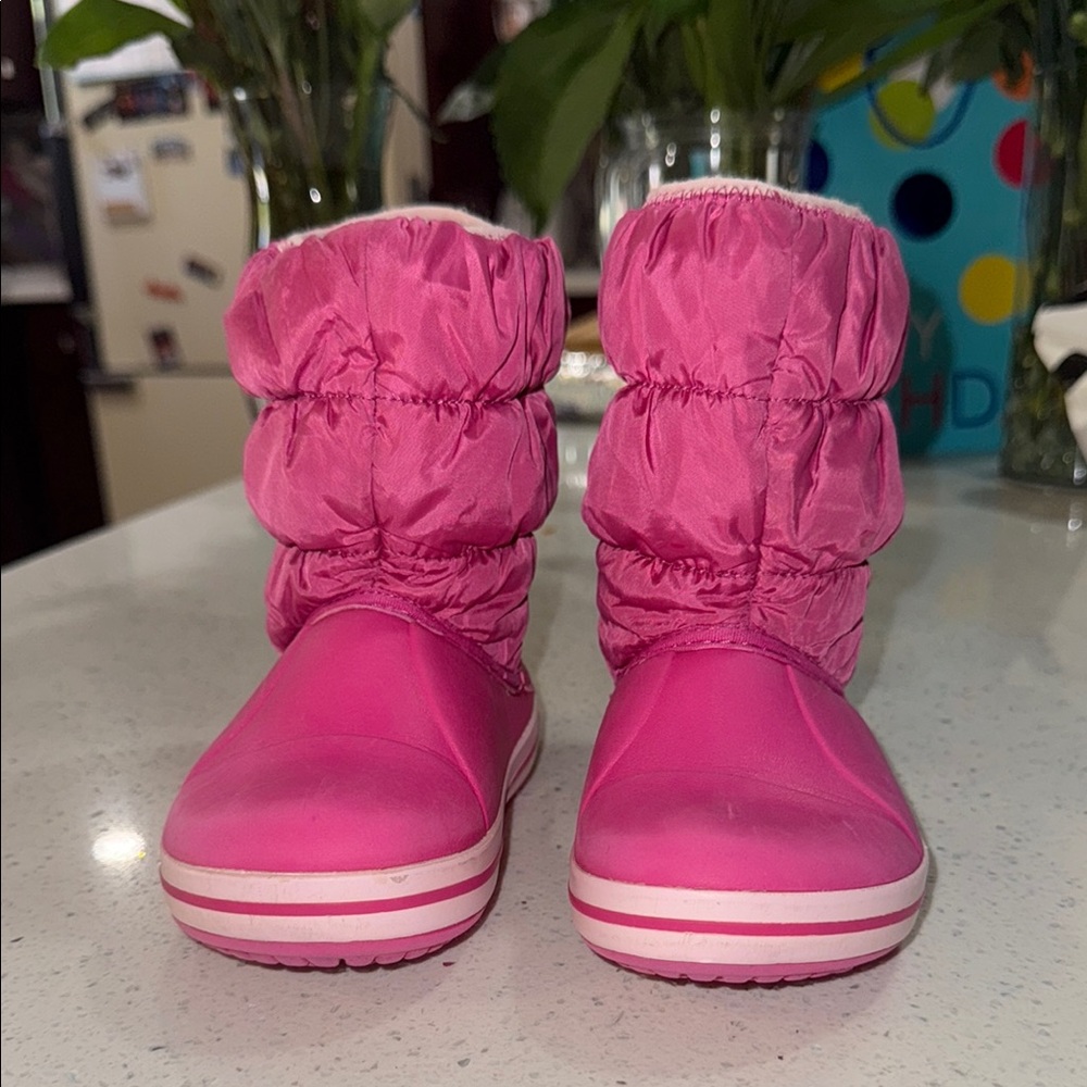 CROCS Kids Fuchsia Snow Boots.